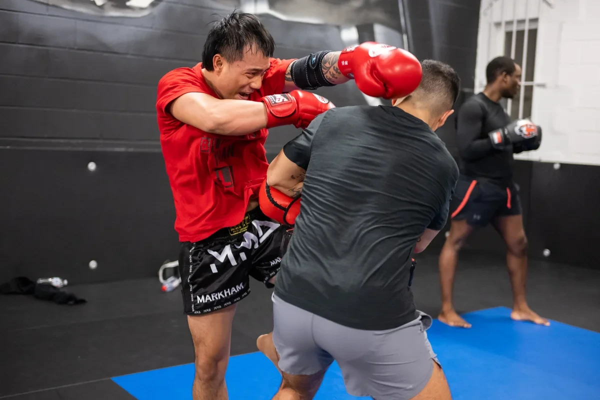 Muay Thai sparring with knee strikes for Toronto students at Yorkdale Martial Arts