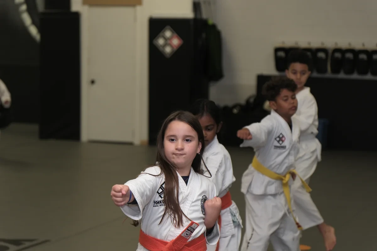 Kids practicing Taekwondo forms at Yorkdale Martial Arts Academy in York Ontario - children's martial arts training