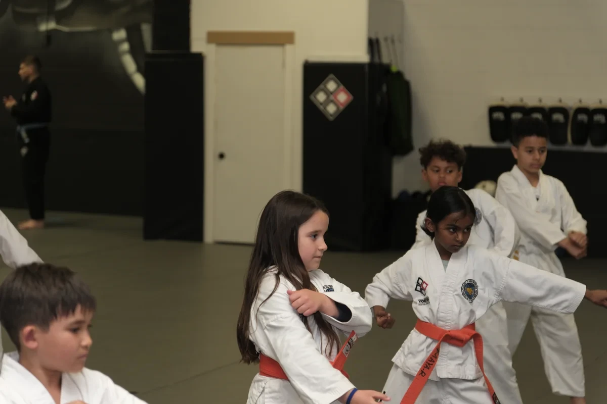 Kids practicing Taekwondo punches serving Toronto at Yorkdale Martial Arts - striking fundamentals